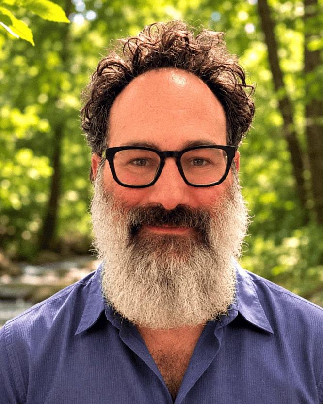 Moishe Goldstein, photographed outdoors on the property.